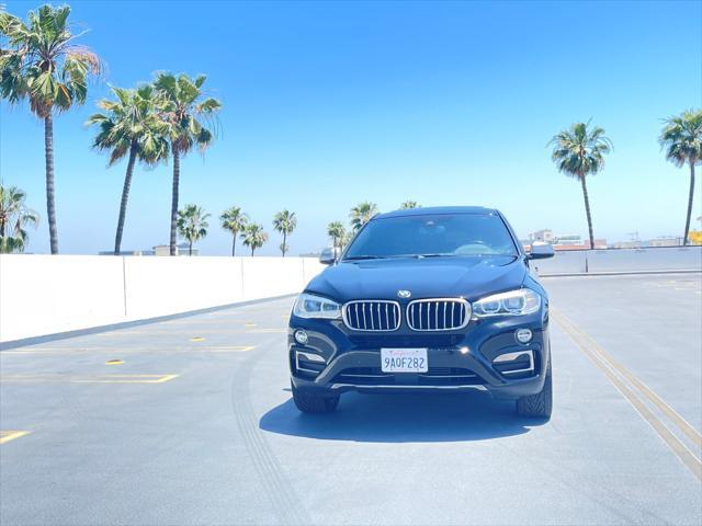 used 2018 BMW X6 car, priced at $23,999