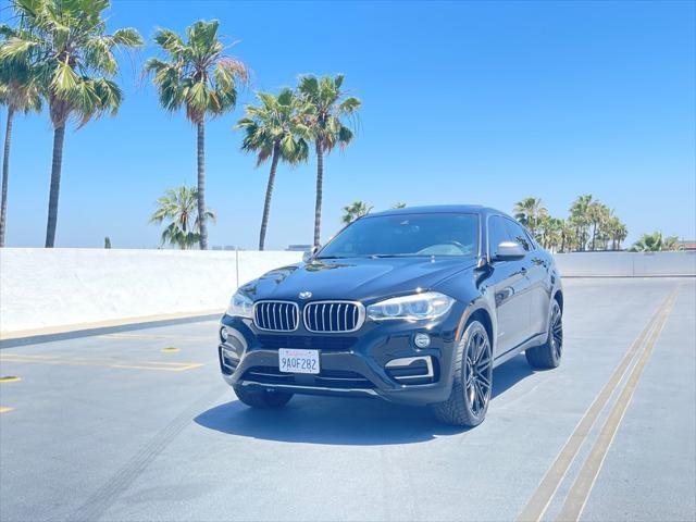 used 2018 BMW X6 car, priced at $23,999
