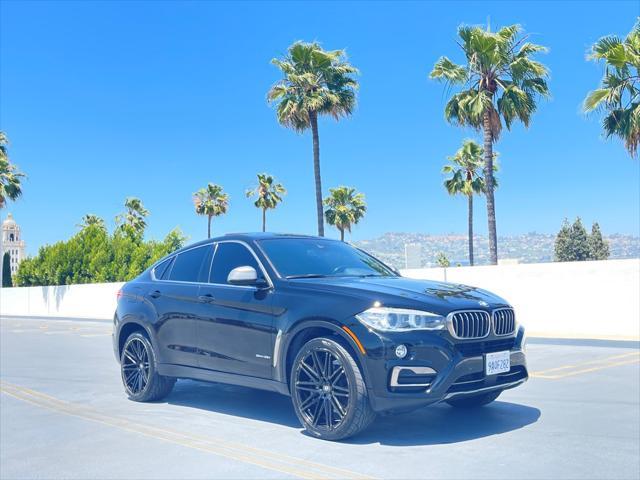 used 2018 BMW X6 car, priced at $23,999