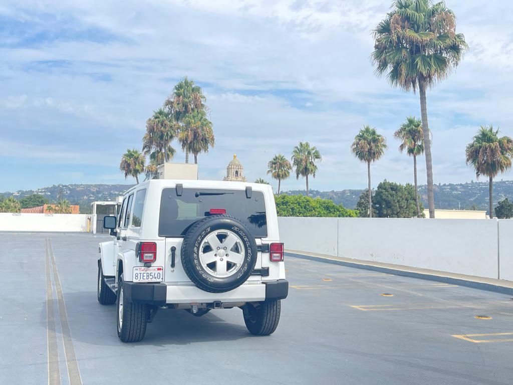 used 2012 Jeep Wrangler Unlimited car, priced at $9,999