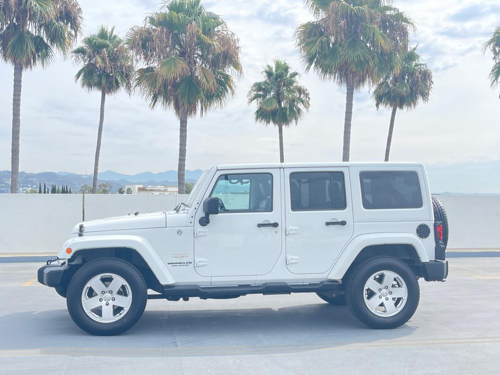 used 2012 Jeep Wrangler Unlimited car, priced at $9,999