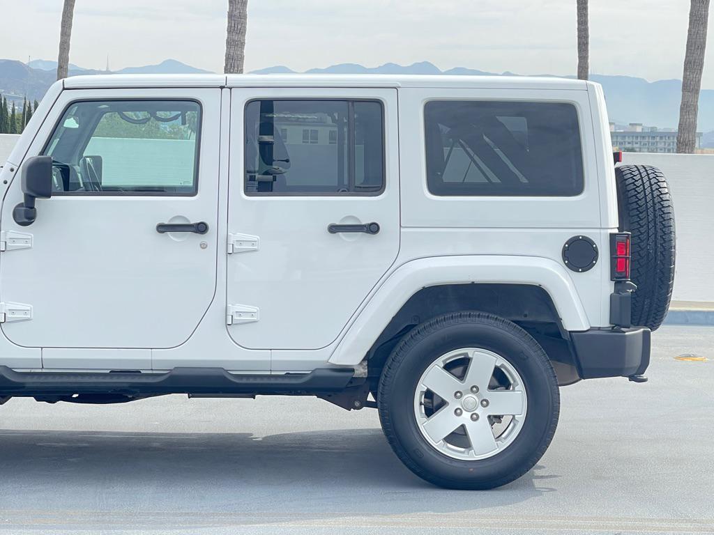 used 2012 Jeep Wrangler Unlimited car, priced at $9,999