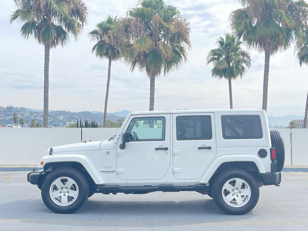 used 2012 Jeep Wrangler Unlimited car, priced at $9,999