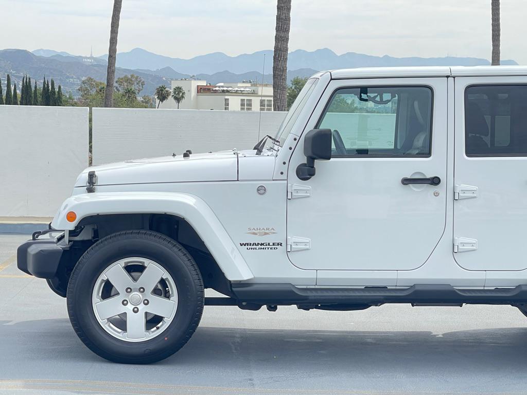 used 2012 Jeep Wrangler Unlimited car, priced at $9,999