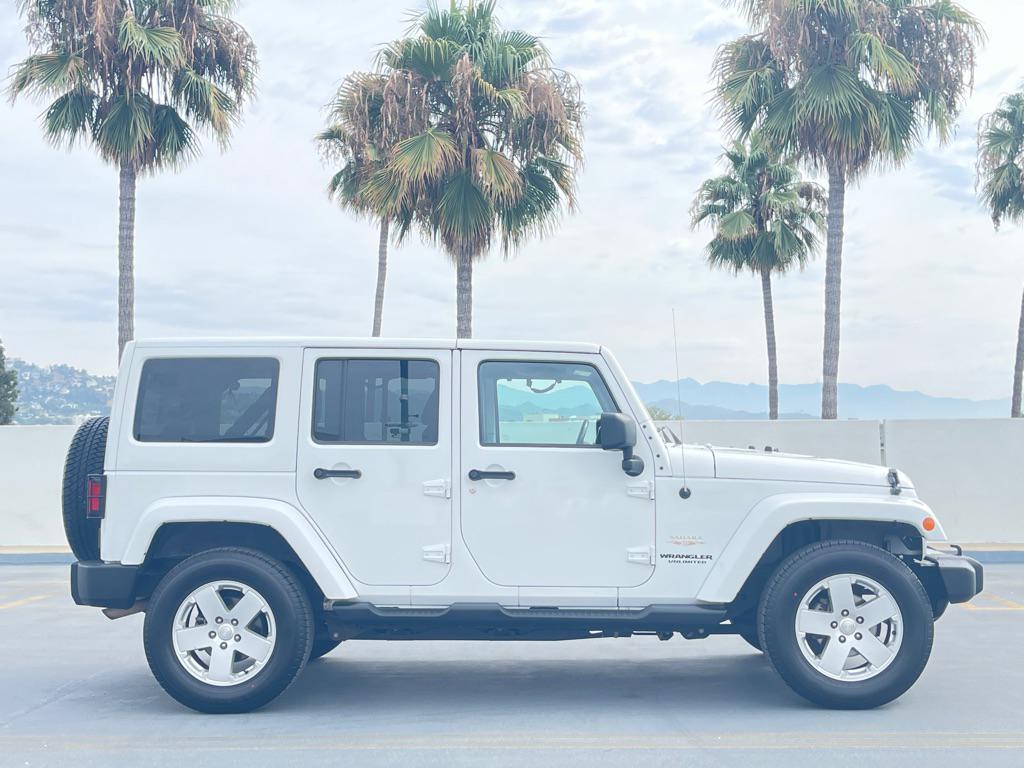 used 2012 Jeep Wrangler Unlimited car, priced at $9,999