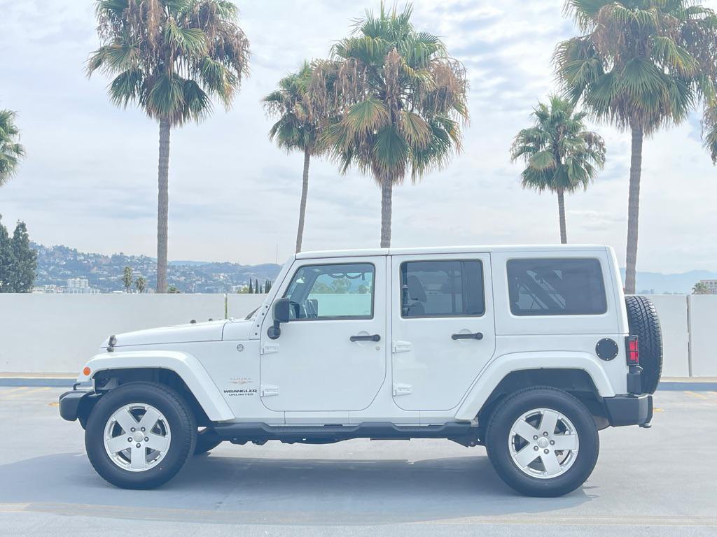 used 2012 Jeep Wrangler Unlimited car, priced at $9,999