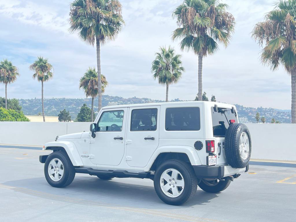 used 2012 Jeep Wrangler Unlimited car, priced at $9,999