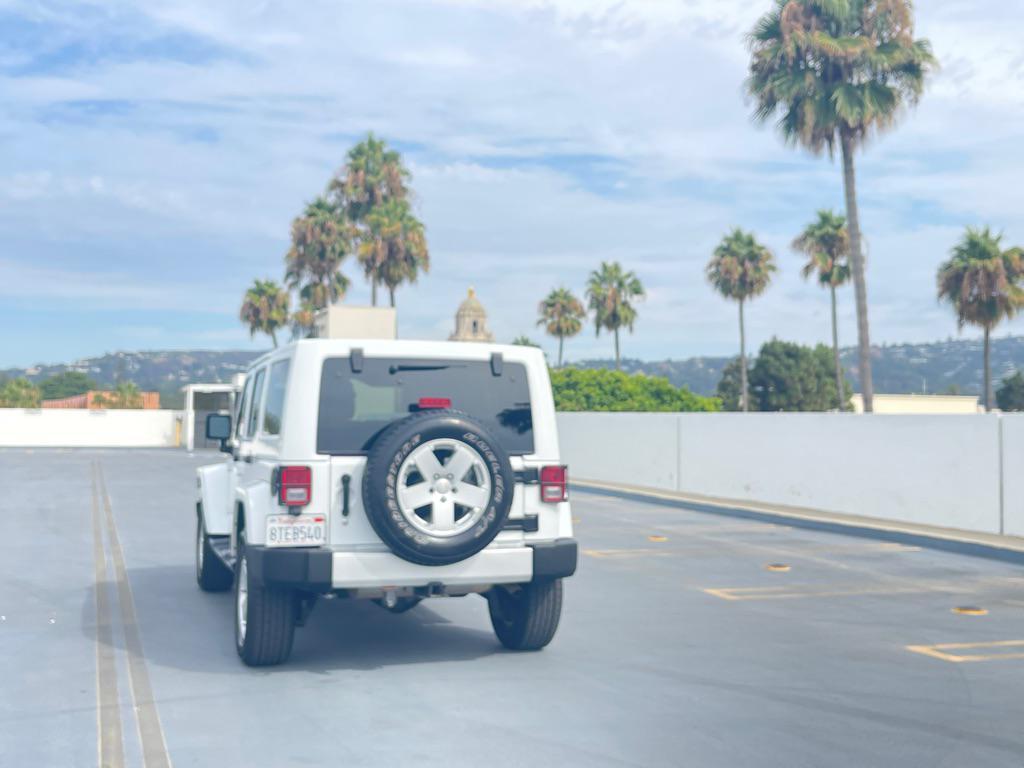 used 2012 Jeep Wrangler Unlimited car, priced at $9,999