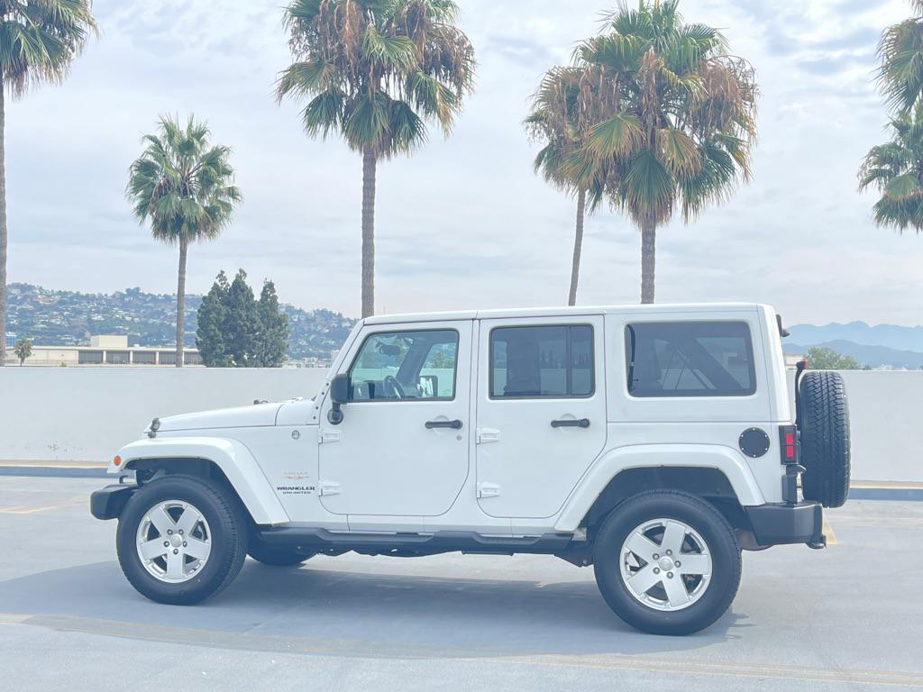 used 2012 Jeep Wrangler Unlimited car, priced at $9,999