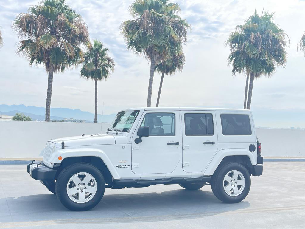 used 2012 Jeep Wrangler Unlimited car, priced at $9,999