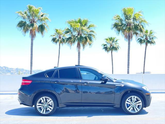used 2014 BMW X6 M car, priced at $21,999
