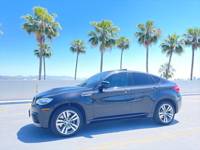 used 2014 BMW X6 M car, priced at $21,999