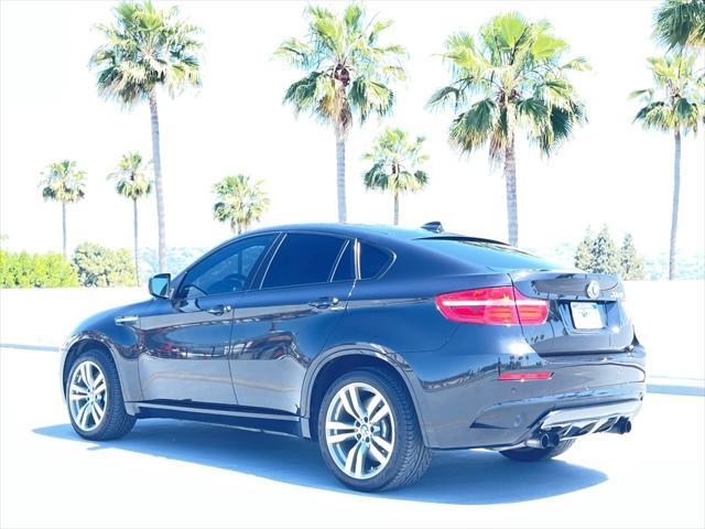 used 2014 BMW X6 M car, priced at $21,999