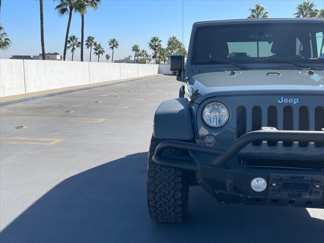 used 2015 Jeep Wrangler car, priced at $14,999