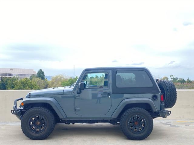 used 2015 Jeep Wrangler car, priced at $16,999