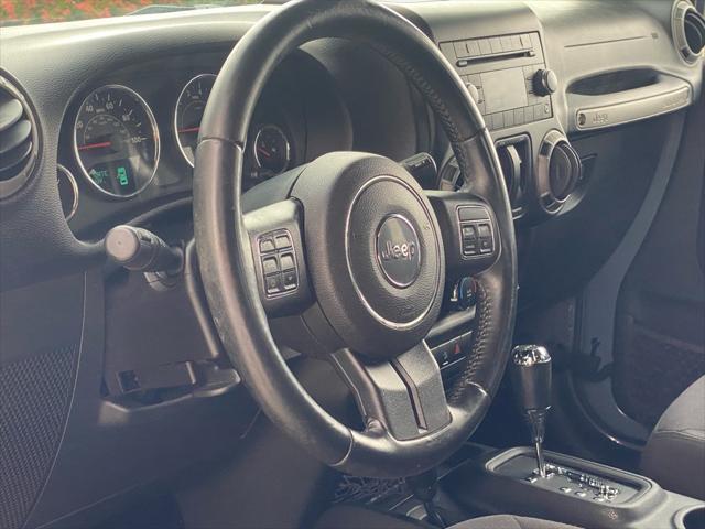 used 2015 Jeep Wrangler car, priced at $16,999