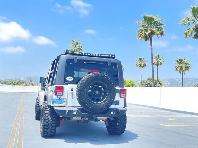 used 2014 Jeep Wrangler Unlimited car, priced at $15,999