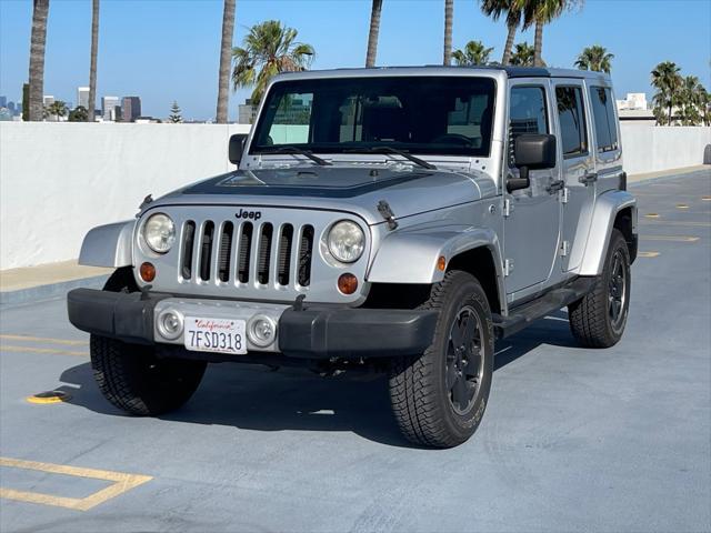 used 2012 Jeep Wrangler Unlimited car, priced at $14,999