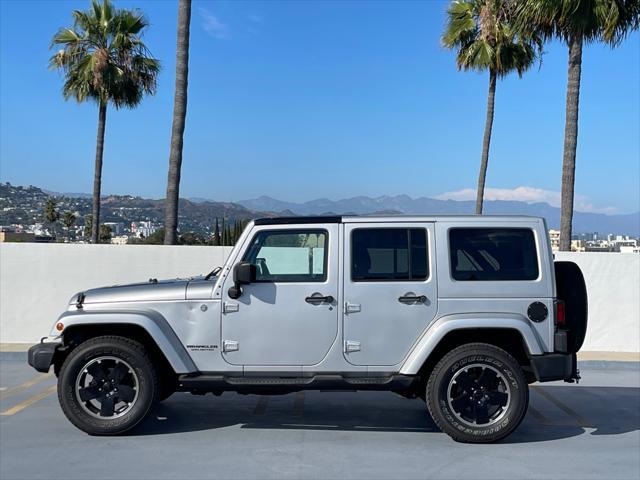 used 2012 Jeep Wrangler Unlimited car, priced at $14,999