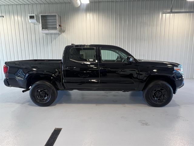 used 2021 Toyota Tacoma car, priced at $33,128