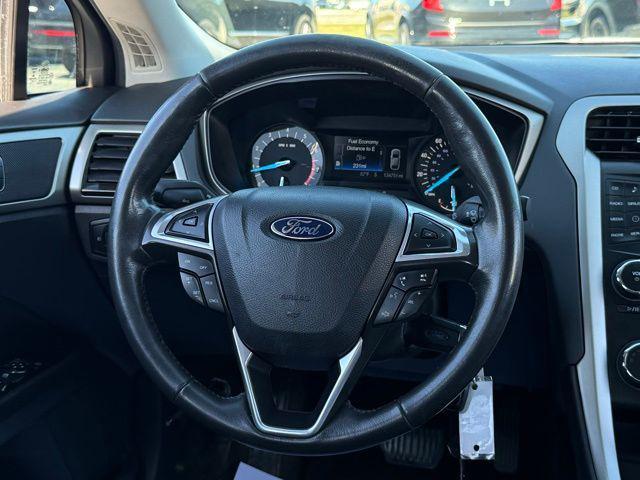 used 2014 Ford Fusion car, priced at $7,000