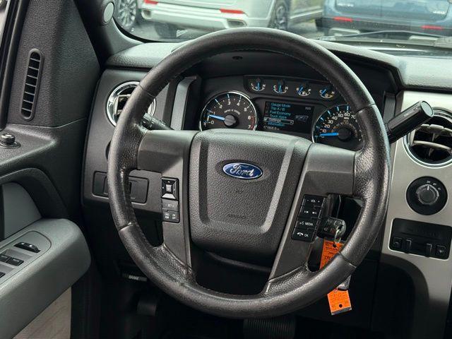 used 2014 Ford F-150 car, priced at $10,000