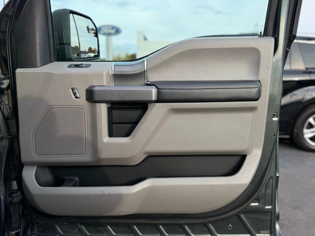 used 2015 Ford F-150 car, priced at $18,000