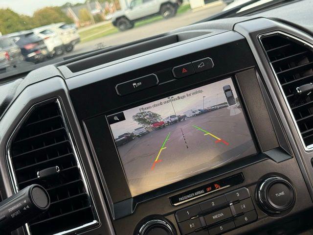 used 2015 Ford F-150 car, priced at $18,000