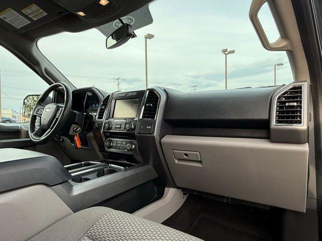 used 2015 Ford F-150 car, priced at $18,000
