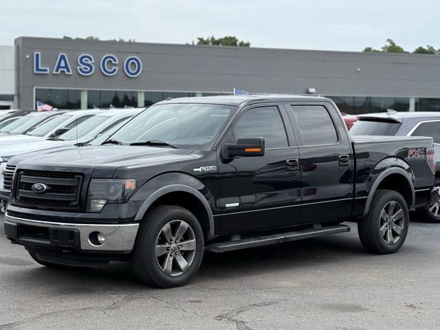 used 2014 Ford F-150 car, priced at $16,000