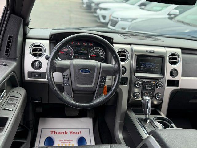 used 2014 Ford F-150 car, priced at $16,000