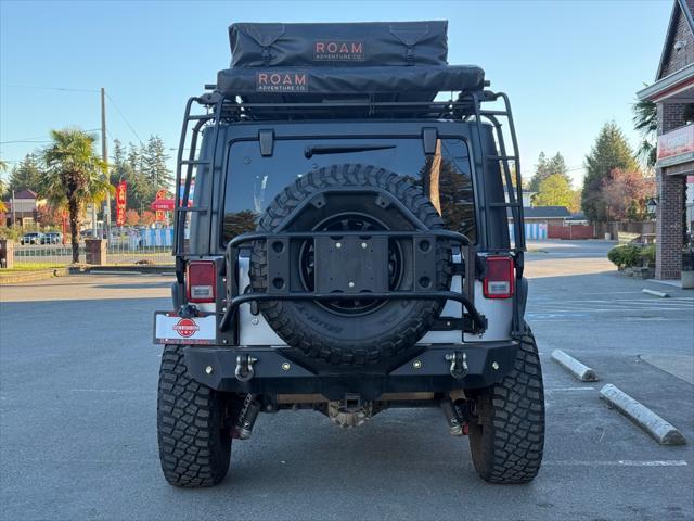 used 2015 Jeep Wrangler car, priced at $23,999