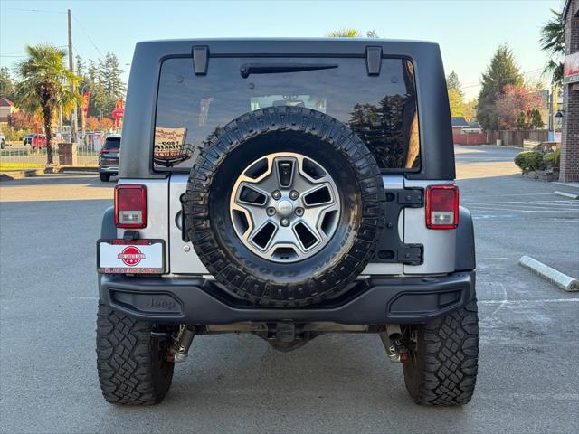 used 2014 Jeep Wrangler car, priced at $17,999