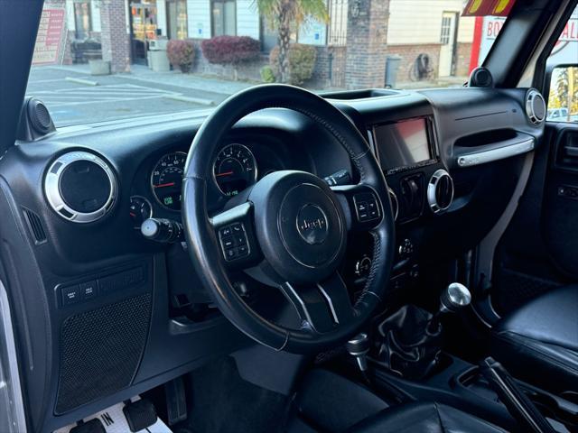 used 2014 Jeep Wrangler car, priced at $17,999