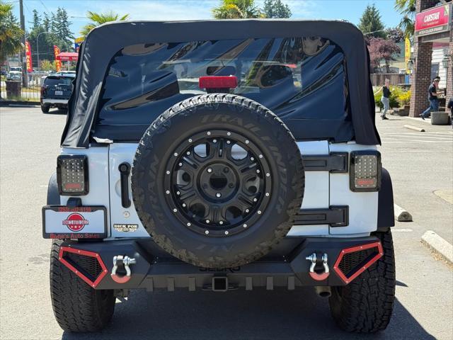 used 2016 Jeep Wrangler car, priced at $15,999