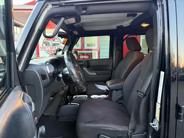 used 2014 Jeep Wrangler Unlimited car, priced at $13,990