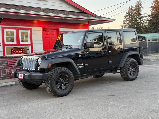 used 2014 Jeep Wrangler Unlimited car, priced at $13,990