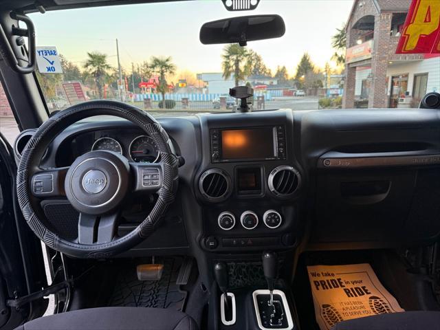 used 2014 Jeep Wrangler Unlimited car, priced at $13,990