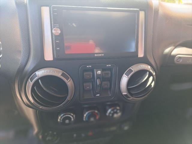 used 2014 Jeep Wrangler Unlimited car, priced at $17,999