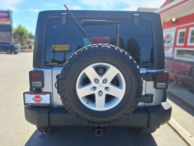 used 2014 Jeep Wrangler Unlimited car, priced at $17,999