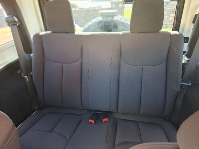 used 2015 Jeep Wrangler car, priced at $13,999