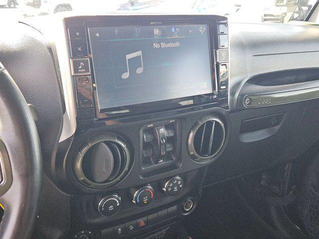 used 2016 Jeep Wrangler Unlimited car, priced at $19,998