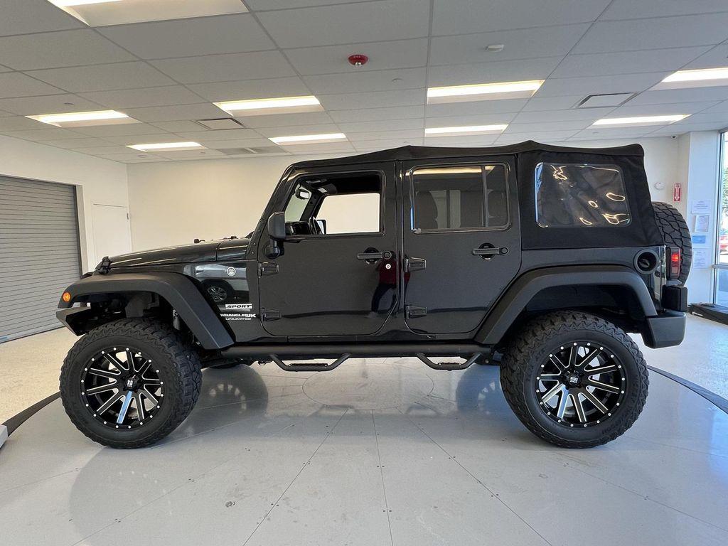 used 2018 Jeep Wrangler JK Unlimited car, priced at $17,095