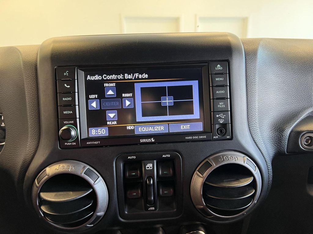 used 2018 Jeep Wrangler JK Unlimited car, priced at $17,095