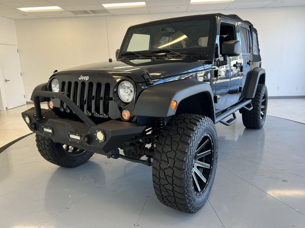 used 2018 Jeep Wrangler JK Unlimited car, priced at $17,095