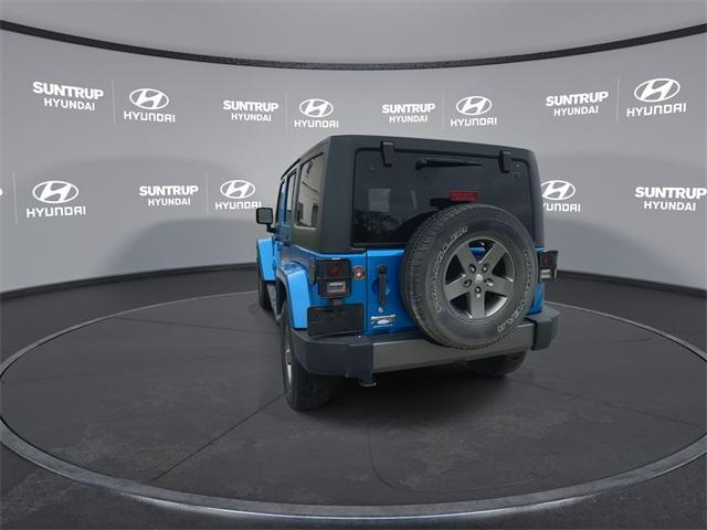 used 2015 Jeep Wrangler Unlimited car, priced at $16,795
