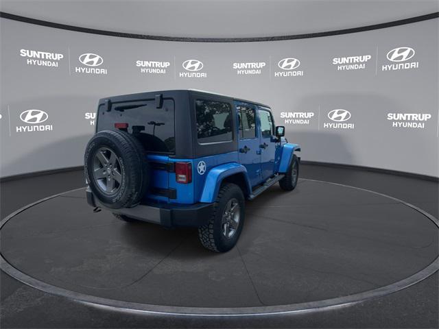 used 2015 Jeep Wrangler Unlimited car, priced at $15,593