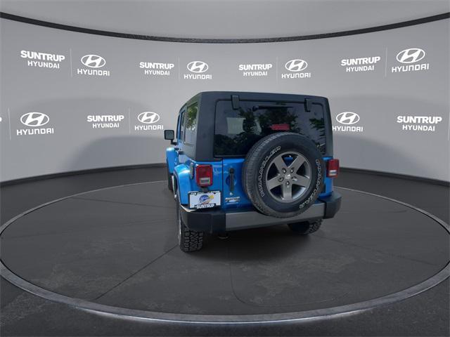used 2015 Jeep Wrangler Unlimited car, priced at $15,593