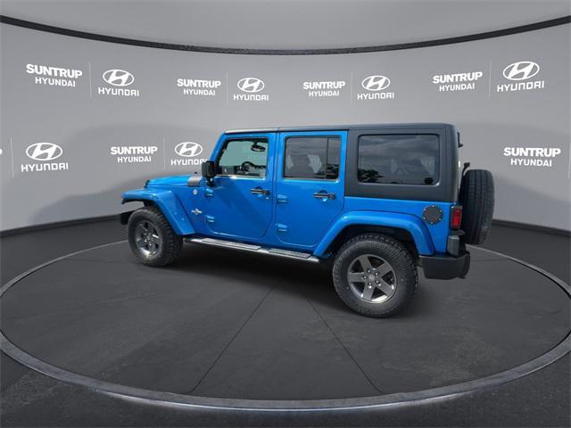 used 2015 Jeep Wrangler Unlimited car, priced at $15,593