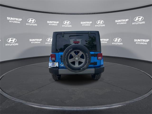 used 2015 Jeep Wrangler Unlimited car, priced at $15,593